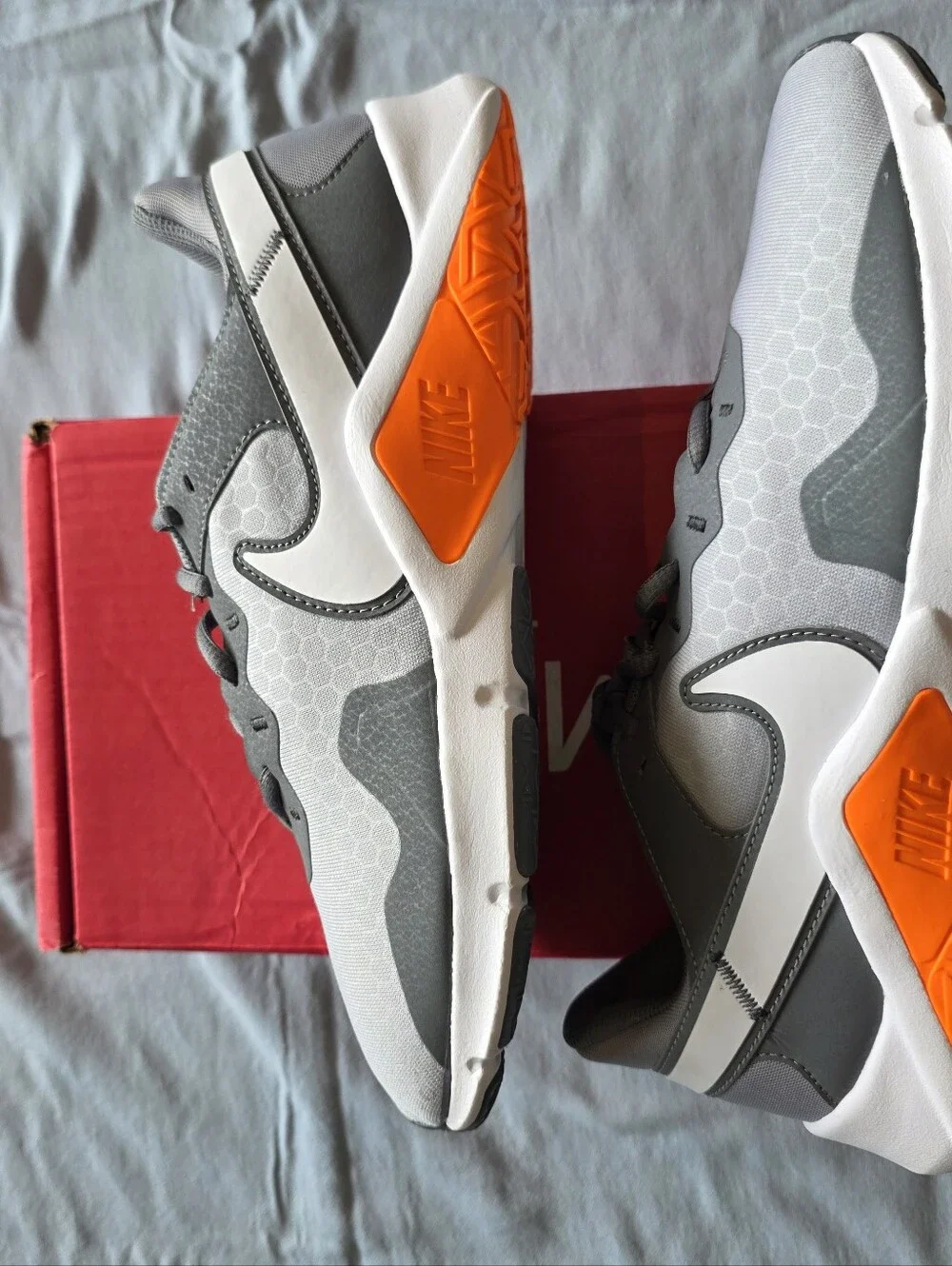 Nike Men’s Gray & White Athletic Sneakers with Orange Accents